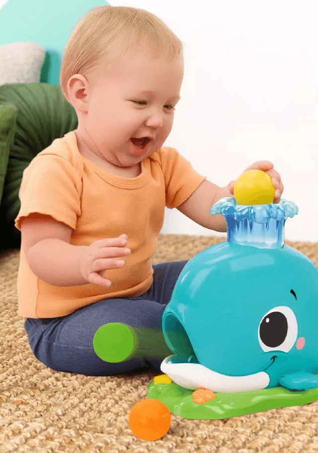 Bright Starts Disney Minnie Mouse Rosy Skies Babywippe mit Vibration, Musik und Spielzeugbogen