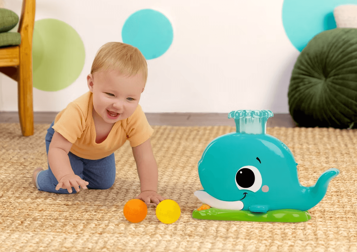 Bright Starts Disney Minnie Mouse Rosy Skies Babywippe mit Vibration, Musik und Spielzeugbogen