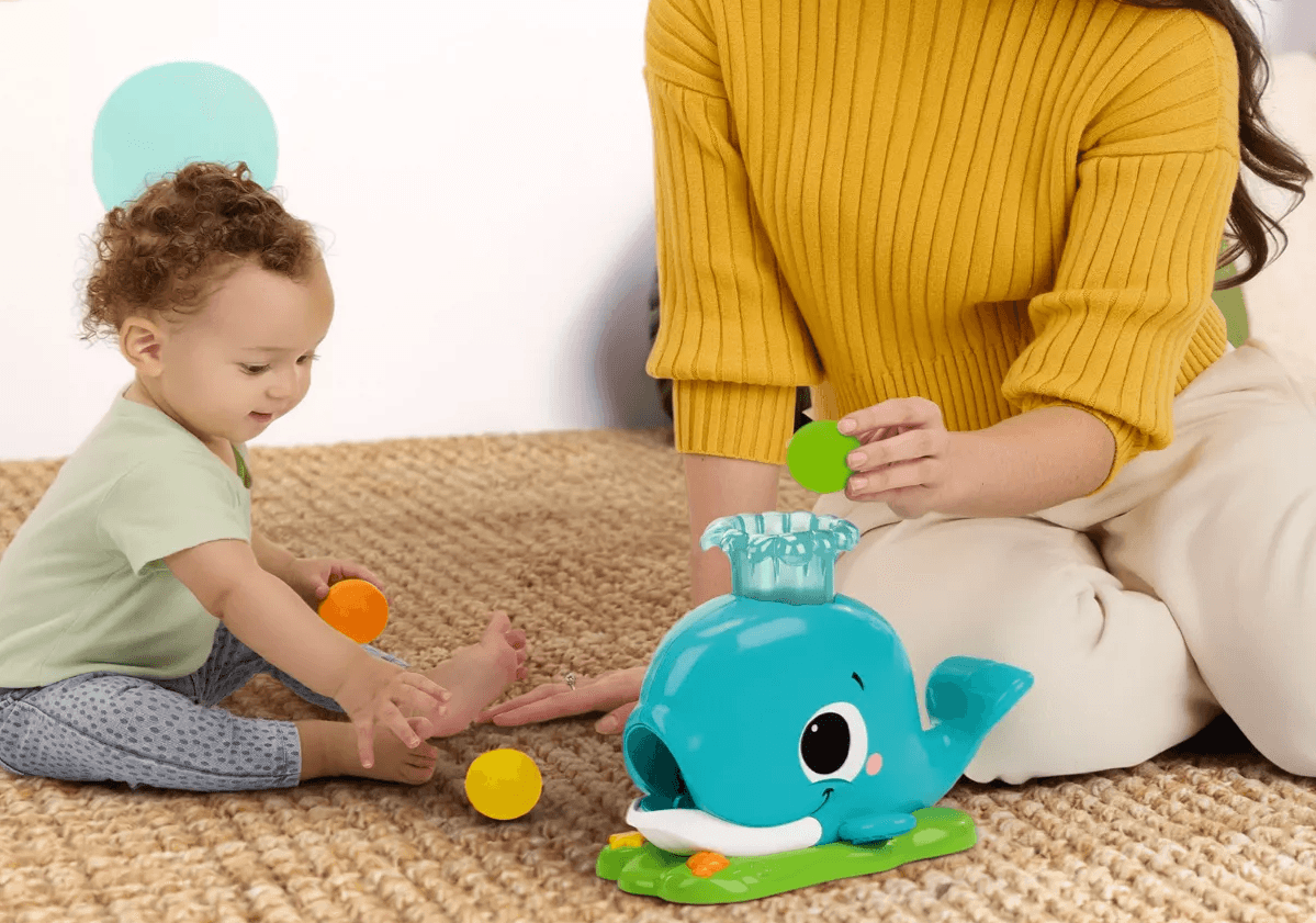 Bright Starts Disney Minnie Mouse Rosy Skies Babywippe mit Vibration, Musik und Spielzeugbogen