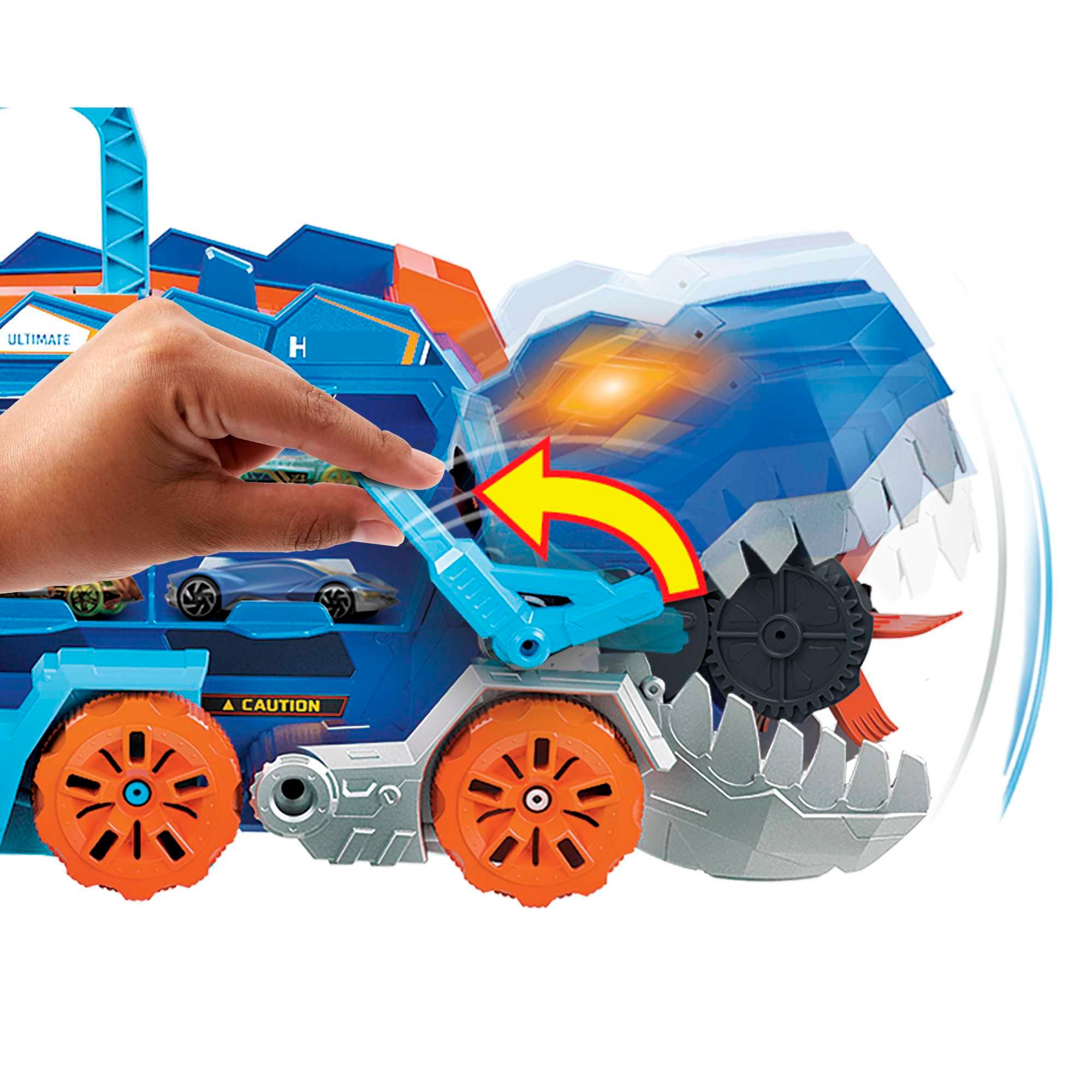 Produktbild Der Hot Wheels City Ultimative Transporter verwandelt sich in einen T-Rex mit Rennstrecke, Aufbewahrung von mehr als 20 Autos 2 von 6