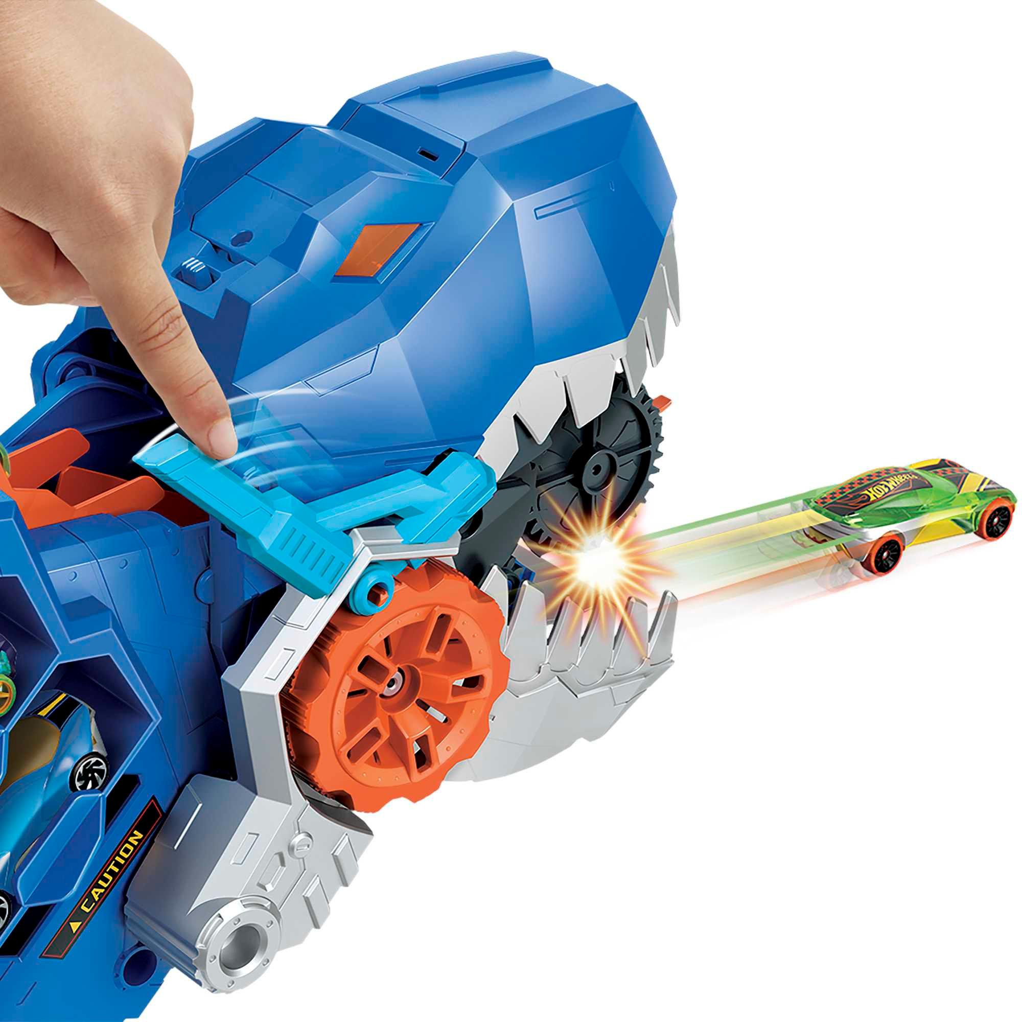 Produktbild Der Hot Wheels City Ultimative Transporter verwandelt sich in einen T-Rex mit Rennstrecke, Aufbewahrung von mehr als 20 Autos 3 von 6