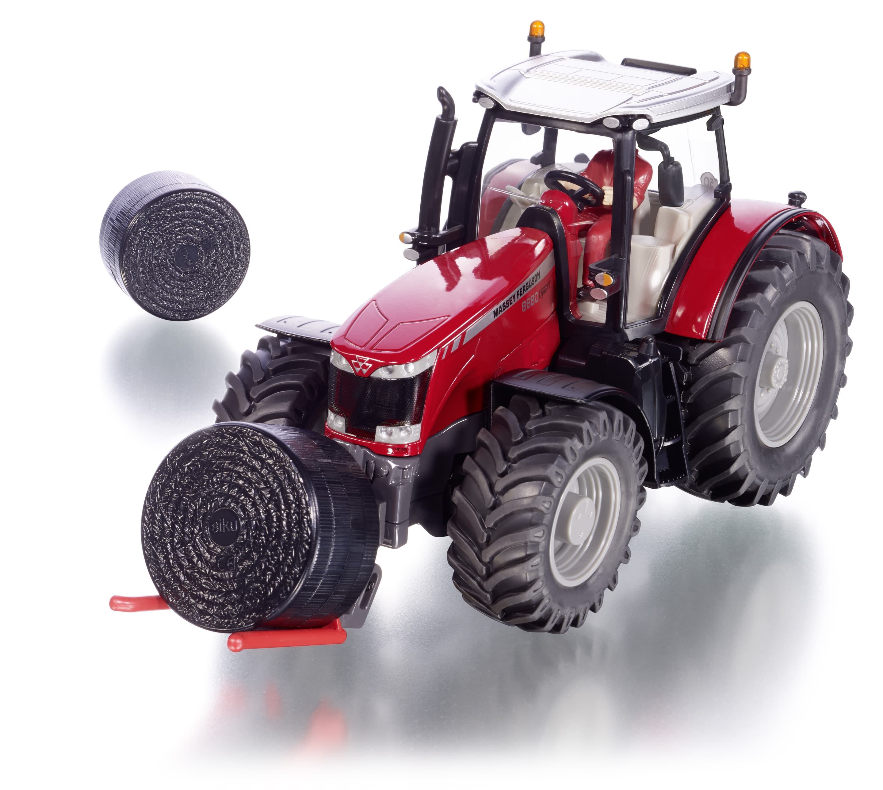 SIKU 8614 Massey Ferguson MF8680 mit Ballentransportgabel und 2 schwarzen Ballen