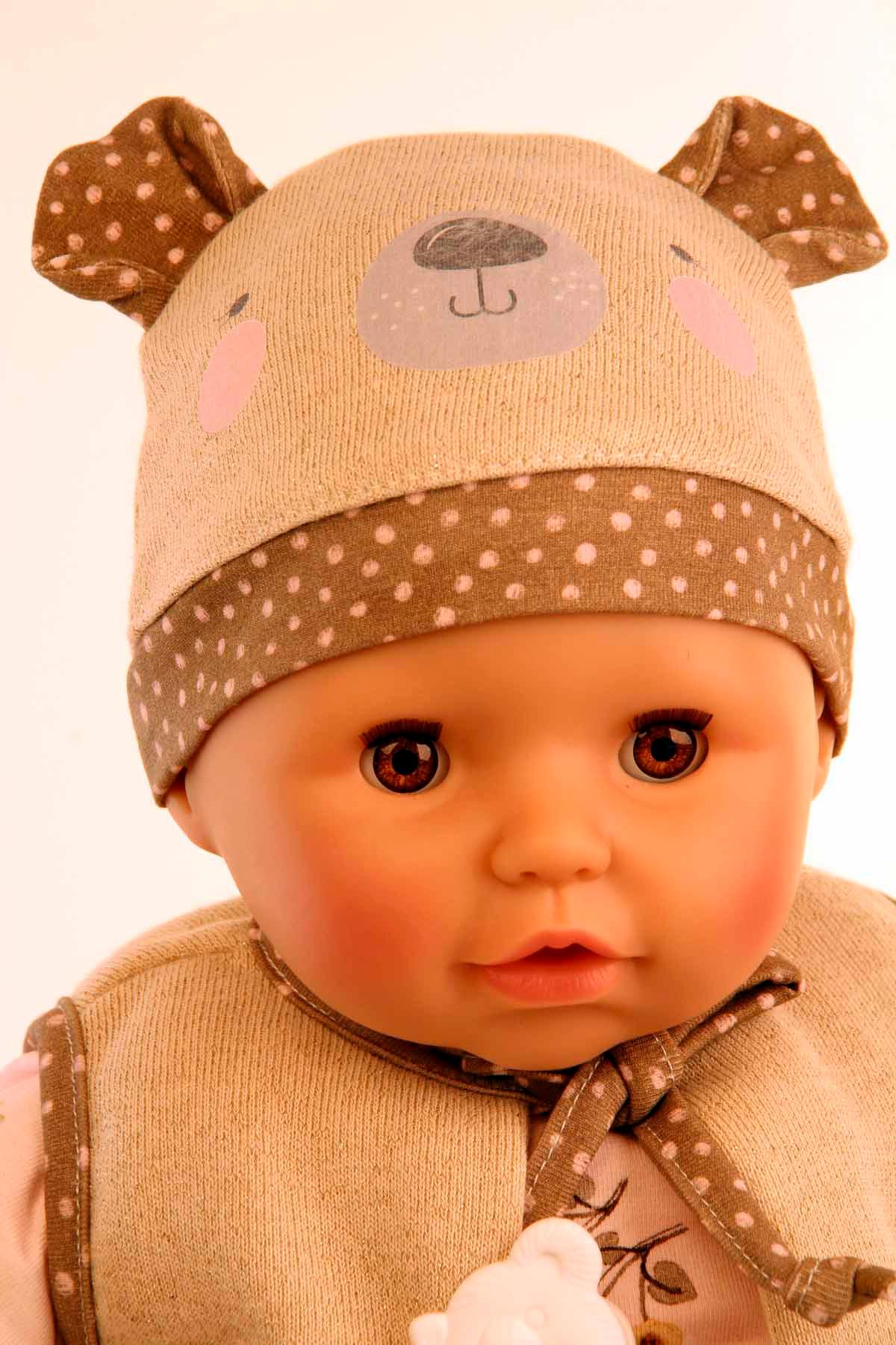 Produktbild Schildkröt-Puppen Baby Amy 45 cm mit Schnuller, Malhaar, braune Schlafaugen, Biberoverall + Mütze+ Weste 4 von 5